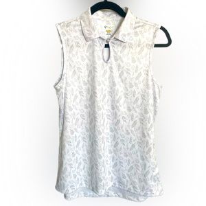 NWOT Greg Norman Collection Women’s Sleeveless Golf Polo White Gray Leaves Med.